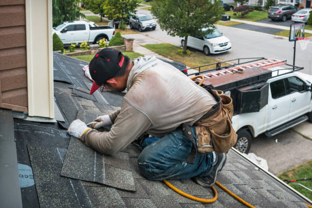 Professional Roof Replacement technician working in Jefferson, NC